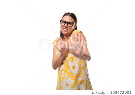 European woman with straight flowing black hair disagrees and says no 108472001