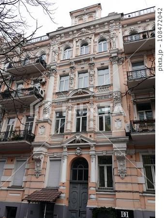 Kiev, Ukraine November 28, 2020: Facade of a building artistically decorated with columns in the center of Kiev 108472042