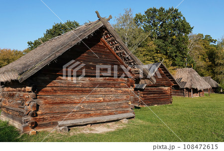 Kiev, Ukraine September 26, 2021: An old Ukrainian house in the National Museum of Folk Architecture and Life of Ukraine "Pirogovo" in Kiev Kiev, Ukraine September 26, 2021: An old Ukrainian house in the National Museum of Folk Architecture and Life of Ukraine "Pirogovo" in Kiev 108472615