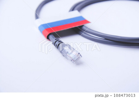 Internet and Russia. Internet cable on the background of the Russian flag. 108473013