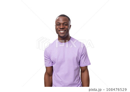 young positive friendly american man with short haircut dressed in lilac t-shirt young positive friendly american man with short haircut dressed in lilac t-shirt 108476529