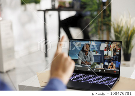Business partners discussing project strategy in videocall on laptop screen. Executive managers coworking remotely in video conference on portable computer with employee in coworking space 108476781
