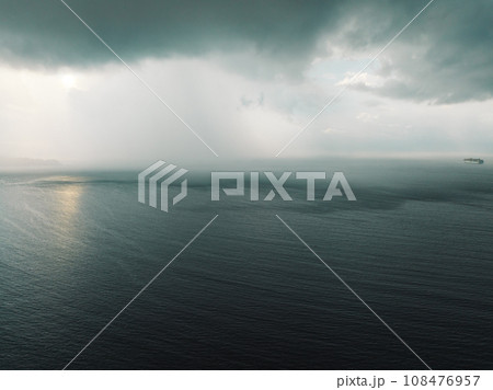 Aerial view of storm clouds with ocean landscape in the morning 108476957