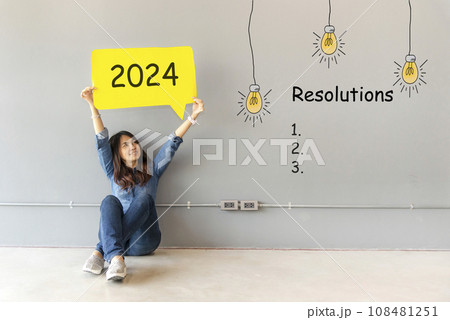 2024 resolutions with young woman cheerful and happy new year. 2024 resolutions with young woman cheerful and happy new year. 108481251
