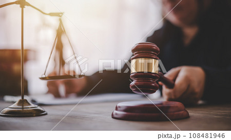 Law theme, mallet of the judge, law enforcement officers, evidence-based cases and documents taken into account.. 108481946