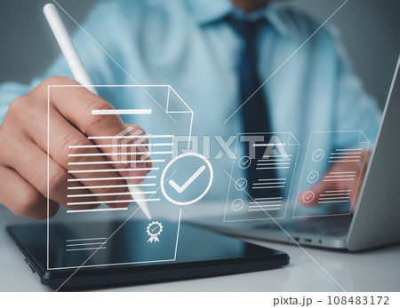 Businessman checks documents online It represents the review of business proposals and approval of project documents or business agreements. 108483172