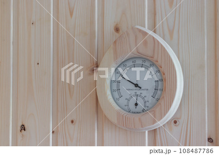Humidity meter and timer in the sauna room 108487786