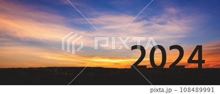 New year 2024 with sunset sky background New year 2024 with sunset sky background 108489991