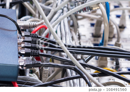 Detail of server room with patch cables 108491560