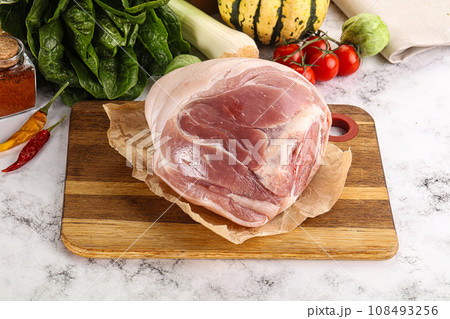 Uncooked raw pork knuckle with spices 108493256