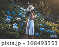 Traveler woman with mobile phone travel in flower garden at Chiang Mai Thailand 108493353