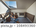 Travel woman with dress relax inside a camper car recreational vehicle 108493360