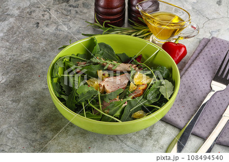 Salad with roasted duck and orange Salad with roasted duck and orange 108494540