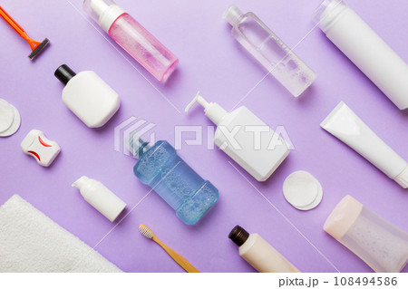 Mockup for bathing products top view flat lay, spa razor, toothpaste, soap, gel and other various accessories. Cosmetics for skin health. Bath Mockup for your logo 108494586