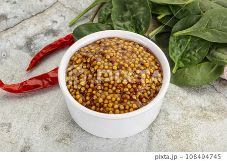 Spicy grain mustard sauce dip 108494745