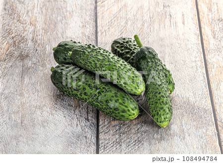 Fresh natural organic cucumbers heap Fresh natural organic cucumbers heap 108494784