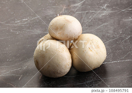 Natural organic ripe champignon mushrooms 108495791