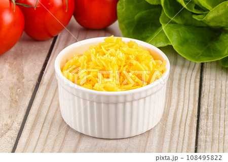 Shredded cheese in the bowl Shredded cheese in the bowl 108495822