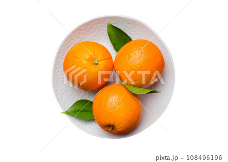 Flat lay of Fresh orange fruit with sliced in plate isolated on white background. Top view with copy space Flat lay of Fresh orange fruit with sliced in plate isolated on white background. Top view with copy space 108496196