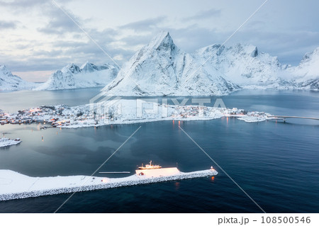 Aerial view on the Lofoten Islands, Norway. Landscape in winter time during day time. Aerial view on the Lofoten Islands, Norway. Landscape in winter time during day time. 108500546