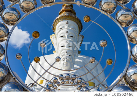 Wat Phra That Pha Kaew, Phetchabun is one of the top Thailand famous temples with a huge five white jade buddhas layered statue sitting on the big lotus, called The Sanctuary of the Five Buddhas. 108502466