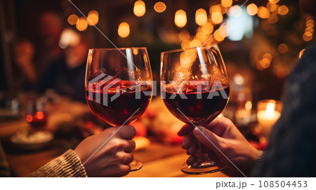 Friends drinking mulled wine 108504453