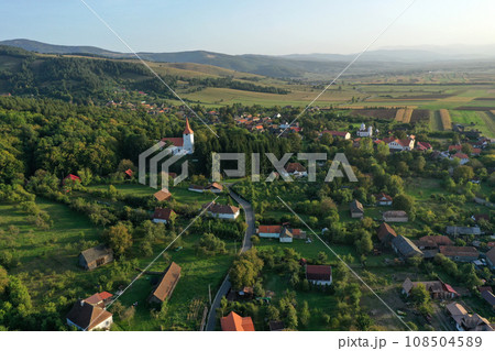 Aerial view of a small village by drone in Transylvania Aerial view of a small village by drone in Transylvania 108504589