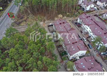 Hostomel, Kyev region Ukraine - 09.04.2022: Top view of the destroyed and burnt houses. Houses were destroyed by rockets or mines from Russian soldiers. Cities of Ukraine after the Russian occupation. Hostomel, Kyev region Ukraine - 09.04.2022: Top view of the destroyed and burnt houses. Houses were destroyed by rockets or mines from Russian soldiers. Cities of Ukraine after the Russian occupation. 108505307