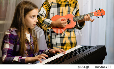 Young Musicians Practicing Together 108508311