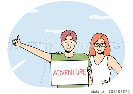 Smiling couple hitchhiking on road Smiling couple hitchhiking on road 108508870