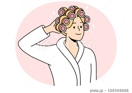 Smiling woman with curlers on head 108508886