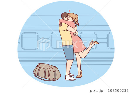 Happy couple hug meeting at railway station 108509232