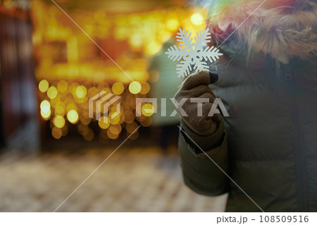 Closeup on woman at christmas fair in city 108509516
