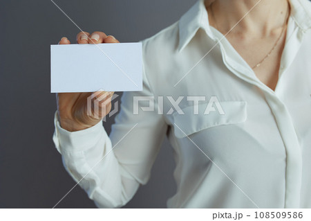 Closeup on small business owner woman isolated on gray Closeup on small business owner woman isolated on gray 108509586