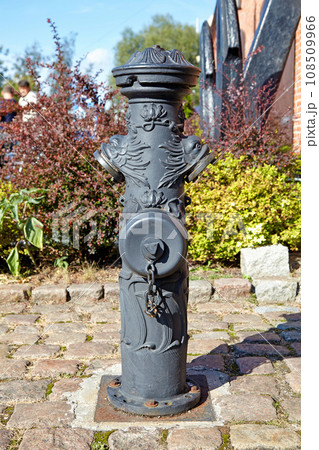 Old cast iron fire hydrant with beautiful patterns 108509966