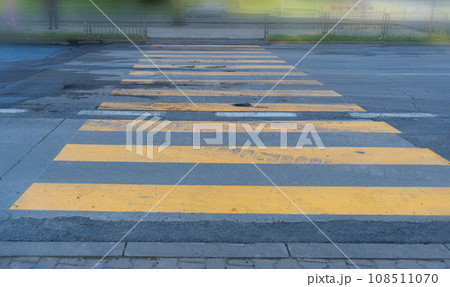 Temporary Pedestrian Crossing, Yellow Crosswalk, Safety Zebra on Modern Tiles Pathway Temporary Pedestrian Crossing, Yellow Crosswalk, Safety Zebra on Modern Tiles Pathway 108511070