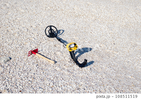 Metal detector on the beach. Metal detector on the beach. 108511519