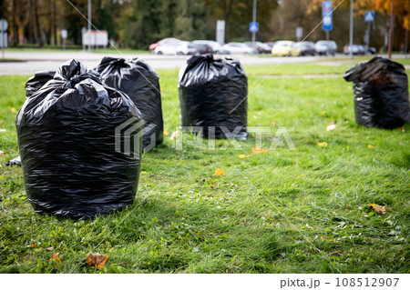 Stack of garbage bags for take out. Clean up the city park in the spring and autumn 108512907