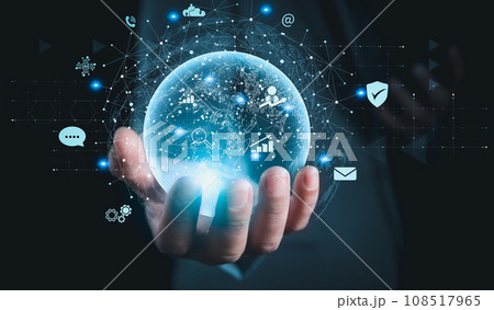 Businessman holding virtual global communication network. Business global internet connection application technology and digital marketing, Financial and banking, Digital link tech, big data. Businessman holding virtual global communication network. Business global internet connection application technology and digital marketing, Financial and banking, Digital link tech, big data. 108517965