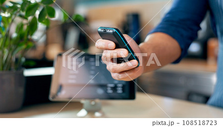 Hand, fintech and a waiter in a coffee shop closeup for sale, payment or purchase of an order. Business, finance and nfc with contactless technology in a cafe or restaurant for takeaway order Hand, fintech and a waiter in a coffee shop closeup for sale, payment or purchase of an order. Business, finance and nfc with contactless technology in a cafe or restaurant for takeaway order 108518723