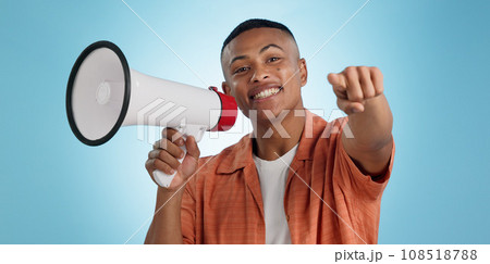 Man, megaphone and choice or pointing you for announcement, broadcast and vote or news on blue background. Portrait of person for join us, attention and voice with sale, bonus or winning in studio Man, megaphone and choice or pointing you for announcement, broadcast and vote or news on blue background. Portrait of person for join us, attention and voice with sale, bonus or winning in studio 108518788