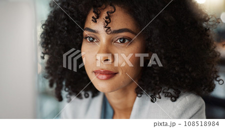 Focus, reading and businesswoman on a computer in the office doing legal research for a case. Technology, thinking and professional attorney from Mexico working on a law project in modern workplace. 108518984