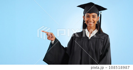 Graduate, studio portrait or happy woman point at school registration, university ads or college information, choice or academy. Mockup space, education and graduation notification on blue background 108518987