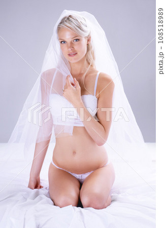 Woman, bride or underwear portrait in studio or sensual boudoir, marriage commitment or wedding lace. Female person, face and lingerie corset for honeymoon veil romance ring, wall background or skin 108518989