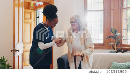 Old woman, walking stick or caregiver in nursing home to help in retirement for medical support. Parkinson, disabled or nurse holding hands of an elderly person in physical therapy rehabilitation 108518996