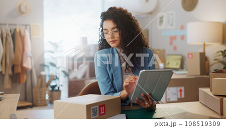 Business woman, tablet and box in logistics for inventory inspection, stock take or storage check at boutique. Female person or fashion designer with technology, parcel or package for courier service Business woman, tablet and box in logistics for inventory inspection, stock take or storage check at boutique. Female person or fashion designer with technology, parcel or package for courier service 108519309