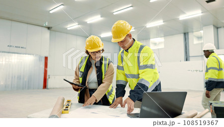 Engineering people, teamwork and blueprint for construction site planning, building design and tablet in warehouse. Industrial worker and manager with digital technology, floor plan and architecture Engineering people, teamwork and blueprint for construction site planning, building design and tablet in warehouse. Industrial worker and manager with digital technology, floor plan and architecture 108519367