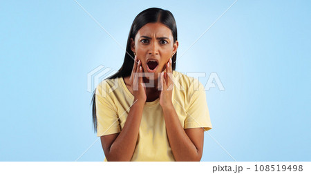 Shock, surprise and woman in portrait in studio with reaction, facial expression and horror on blue background. Open mouth, wow for news or announcement, mockup space and gossip drama with mind blown Shock, surprise and woman in portrait in studio with reaction, facial expression and horror on blue background. Open mouth, wow for news or announcement, mockup space and gossip drama with mind blown 108519498