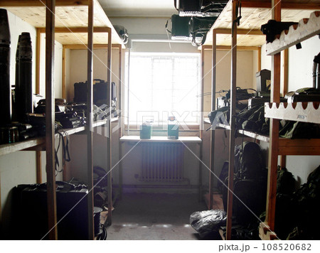 Military base, room and equipment for war, training or defense team on a mission for battle. Storage, army and guns or gear at warrior security bootcamp for government armed forces service warzone. 108520682