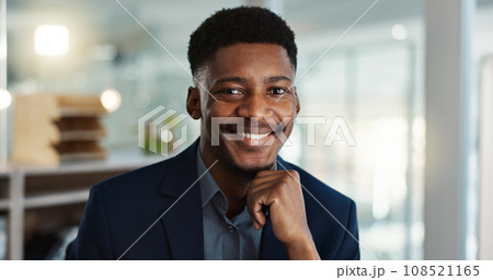 Face, smile and young businessman in office with confidence and positive attitude for startup at work. Employee, professional and portrait of entrepreneur and happy or ready for career in accounting 108521165